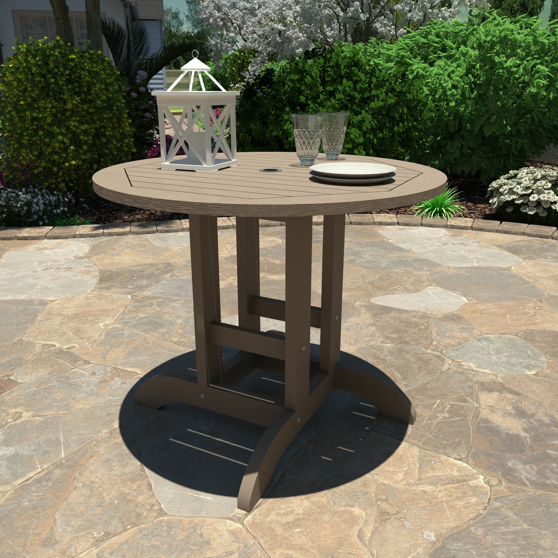 Light brown 36” diameter dining height table with lantern, plates, and glasses