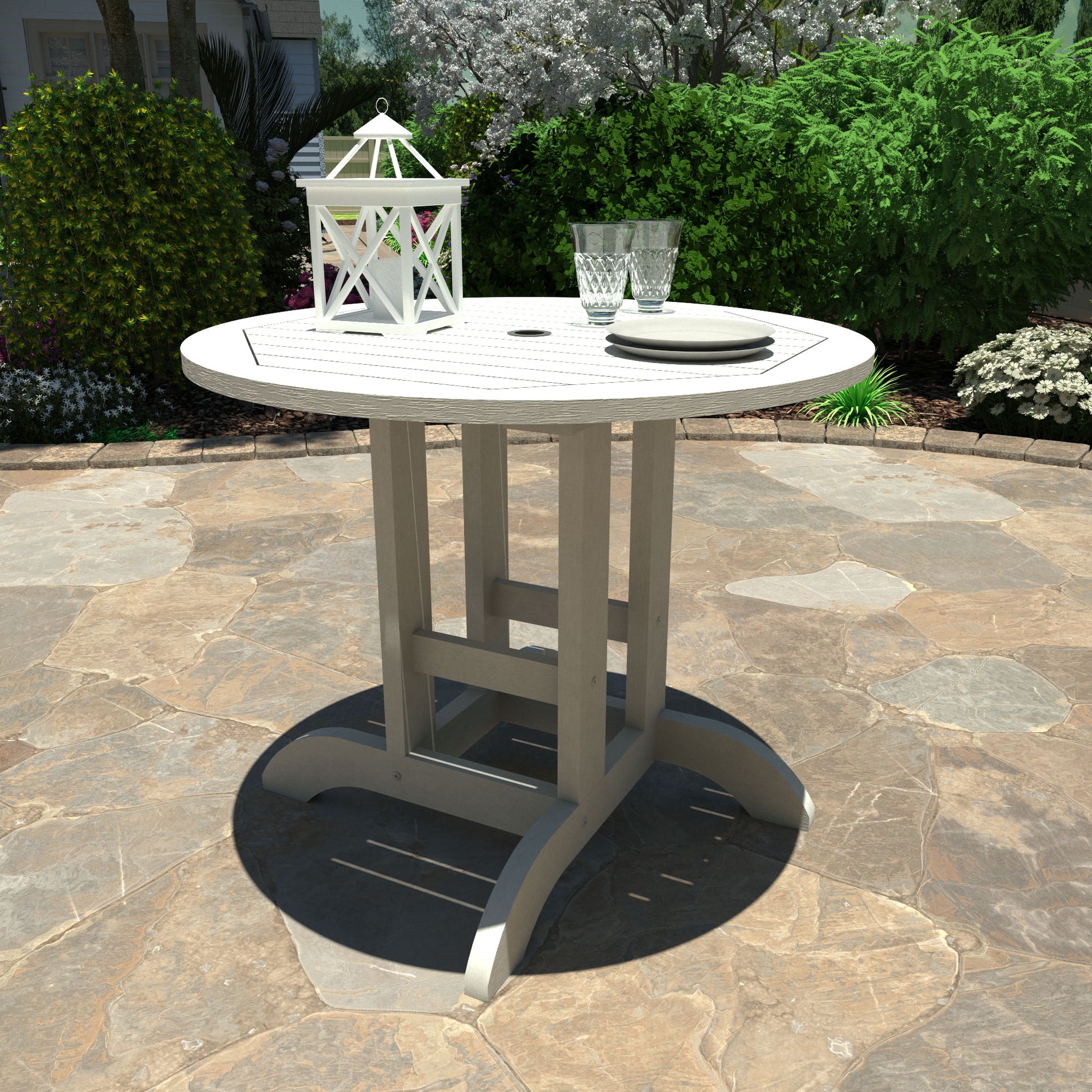 White 36” diameter dining height table with lantern, plates, and glasses