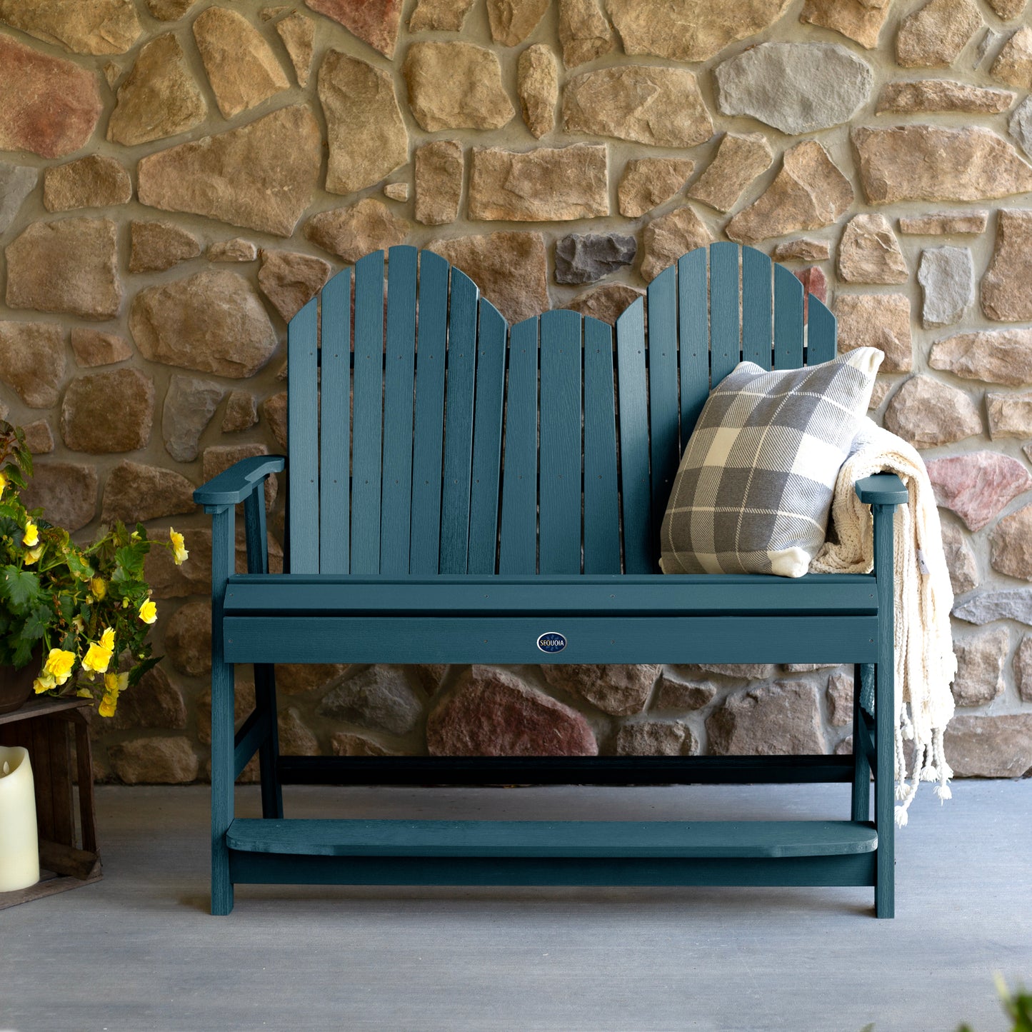 Light blue Lighthouse counter height Adirondack bench against stone wall
