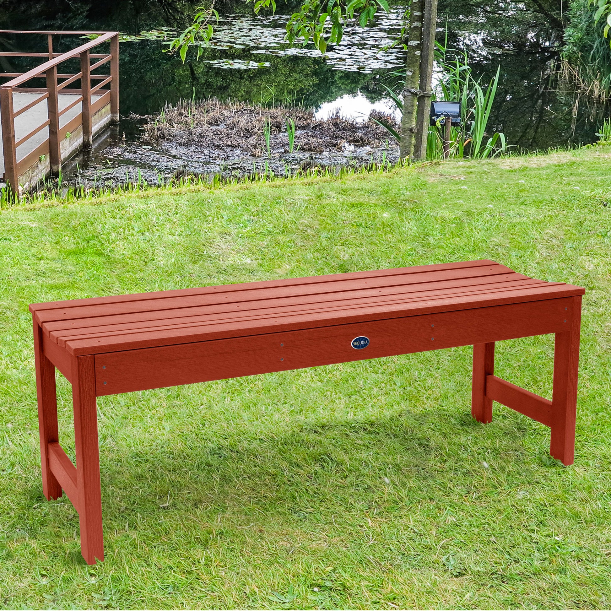 4ft red Blue Ridge backless bench on grassy lawn