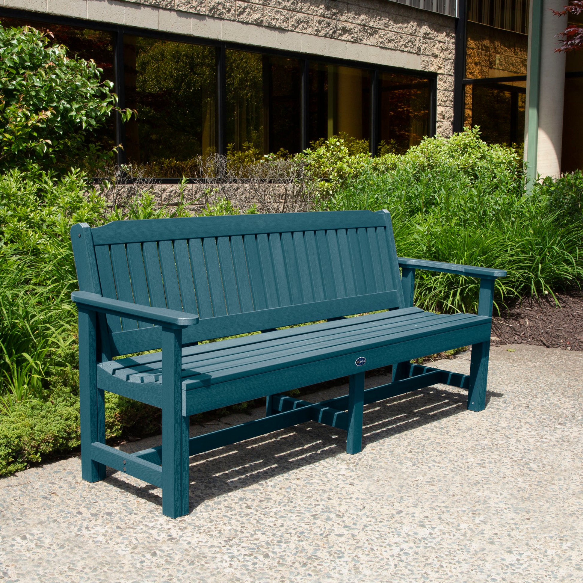 Light blue 6ft Blue Ridge Garden Bench with bushes in background