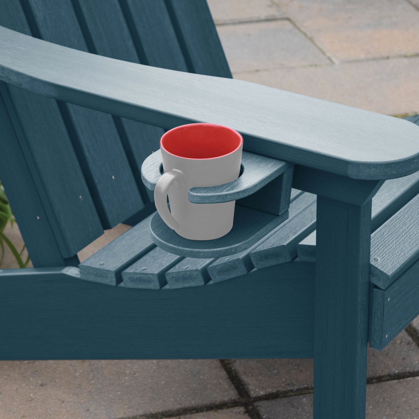 Light blue Adirondack chair and cupholder with mug