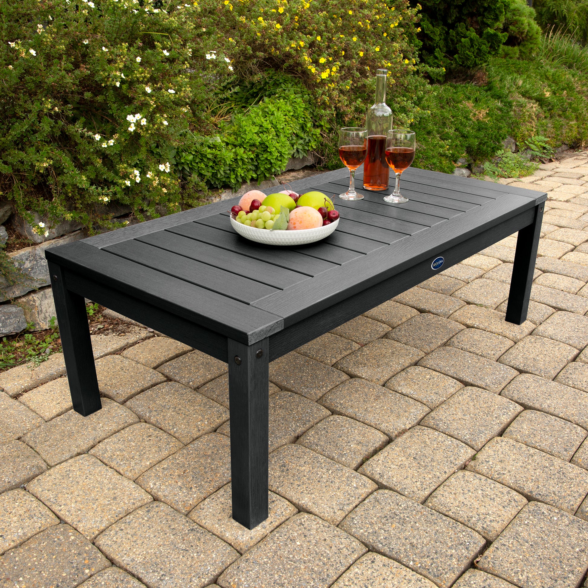 Black Adirondack Conversation table with wine and fruit bowl