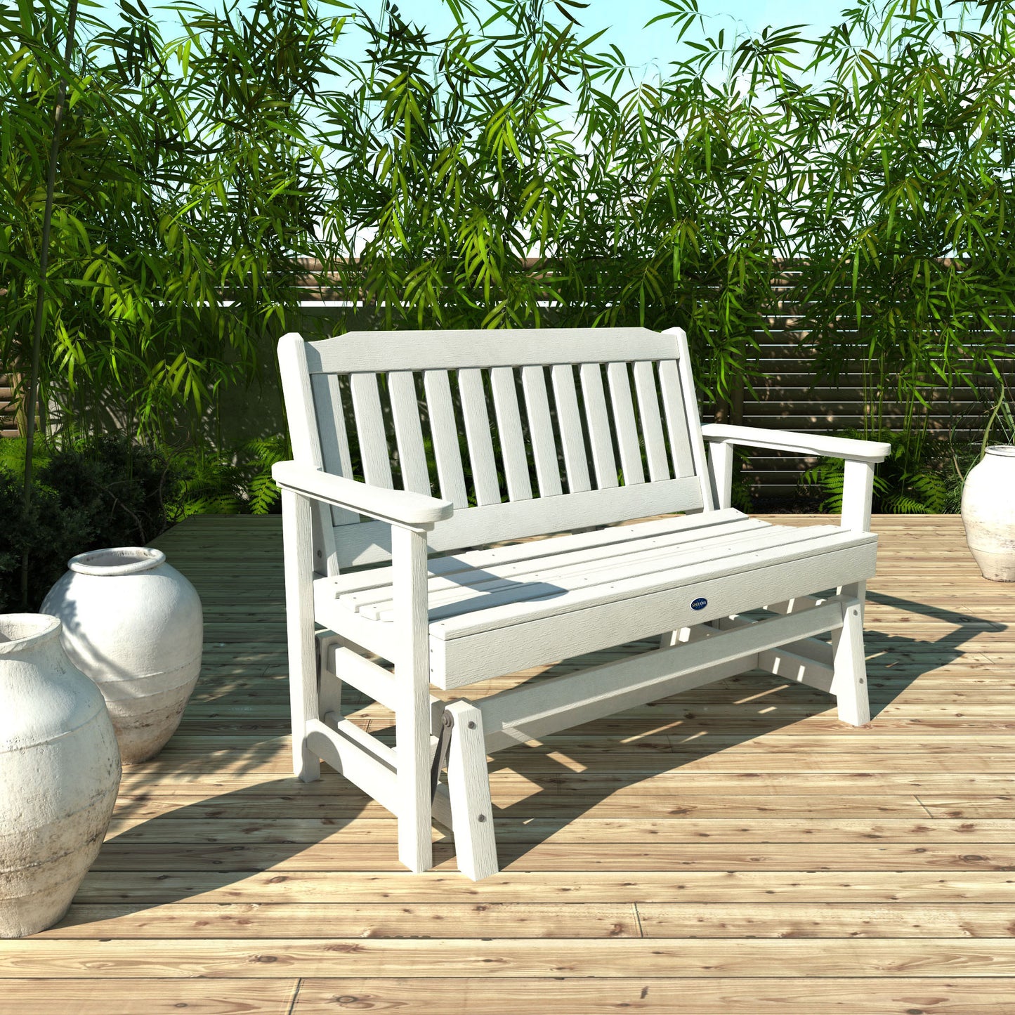 4ft White Blue Ridge glider bench on wooden patio with plants in background