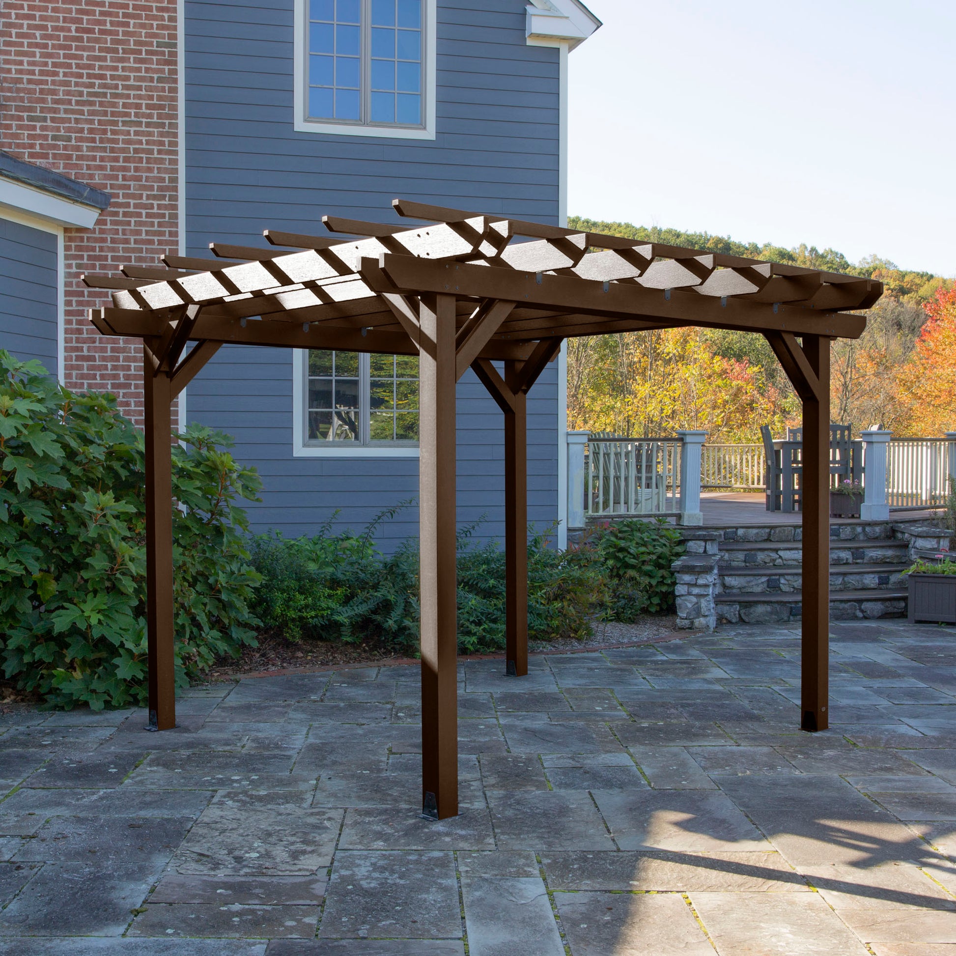 Brown St. Clair 10 x 12 Pergola on stone patio