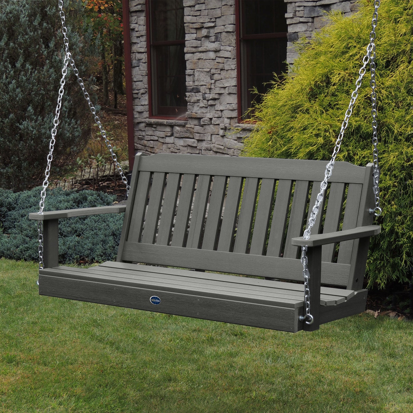 Gray 5ft Blue Ridge porch swing with stone house in background