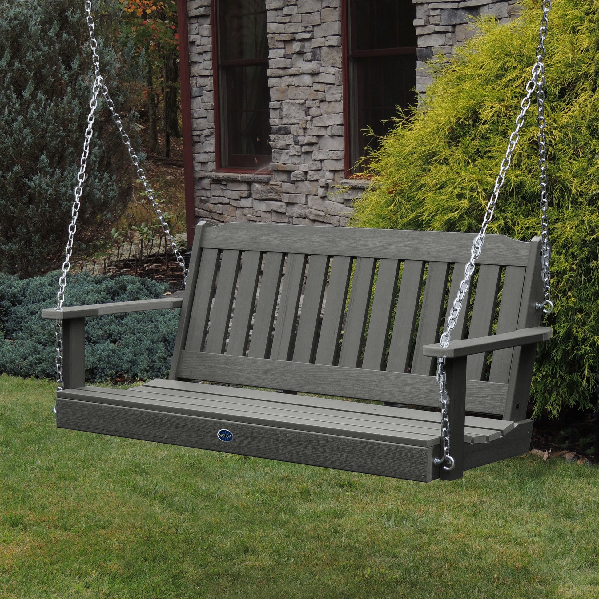 Gray 5ft Blue Ridge porch swing with stone house in background