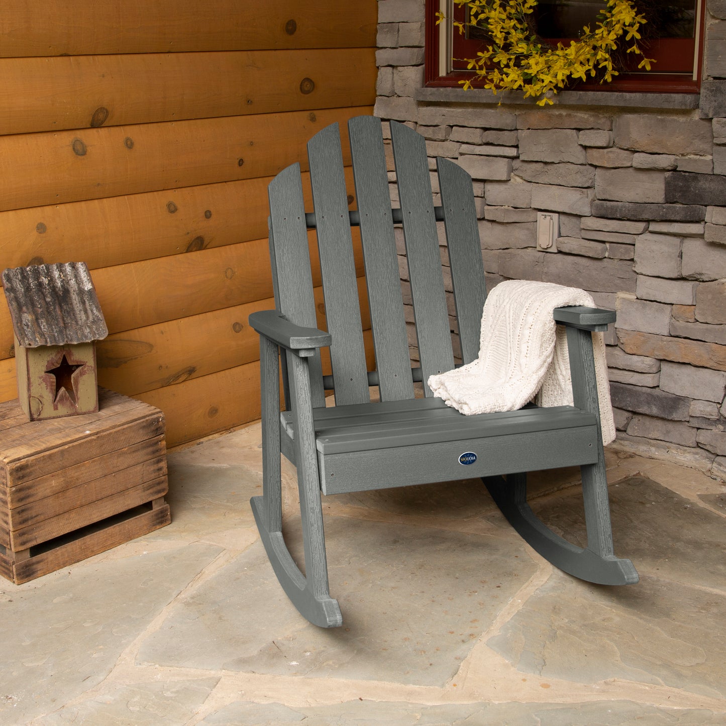 Gray Lighthouse Garden Rocking Chair on porch with blanket