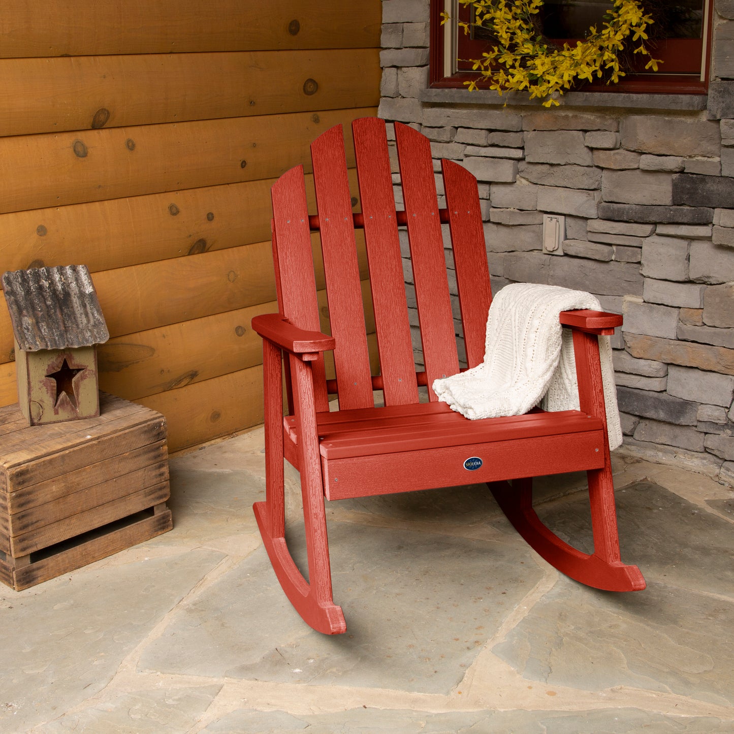 Red Lighthouse Garden Rocking Chair on porch with blanket