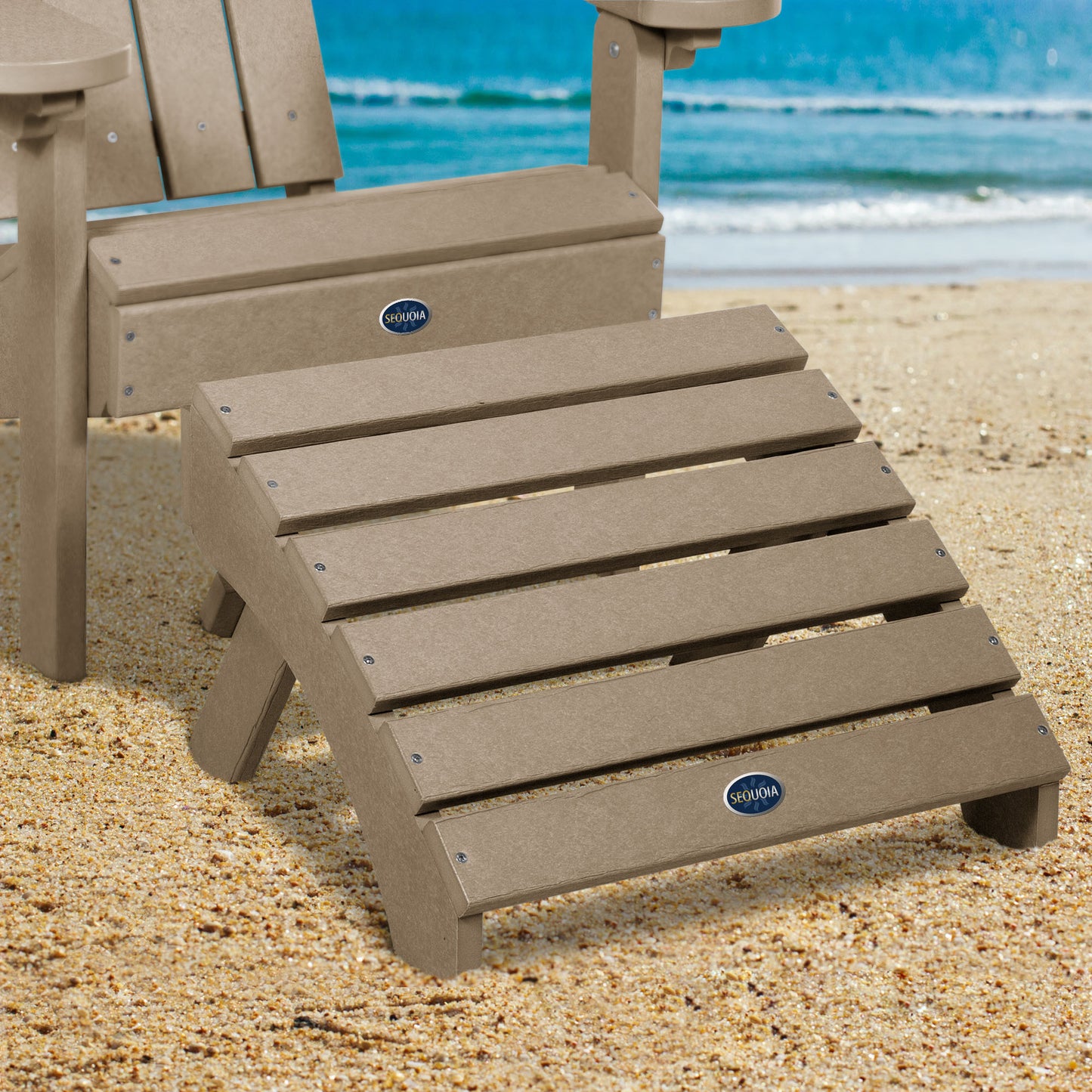 Tan Sunrise Coast folding ottoman and Adirondack chair on beach