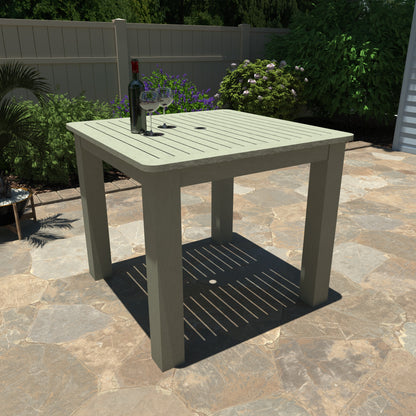 Light green Homestead 42x42 counter height table with wine and glasses