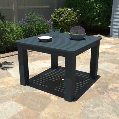 Dark Blue Homestead Square 42x42 table with plates and plant