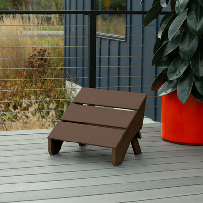 Brown Granite Hills folding ottoman on a deck