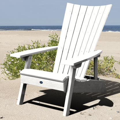 White Granite Hills folding and reclining Adirondack chair on a beach