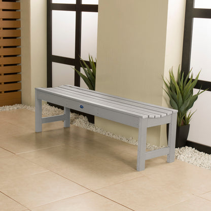 5ft light grey Blue Ridge backless bench in stone porch area