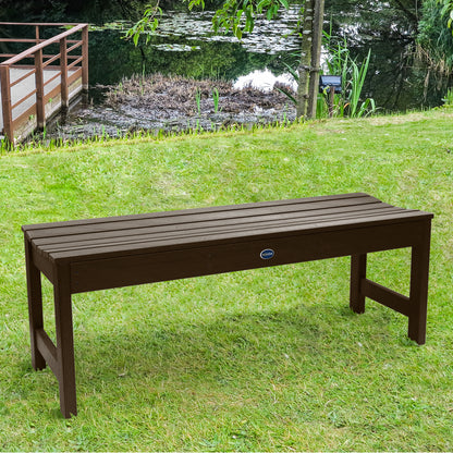 4ft brown Blue Ridge backless bench on grassy lawn