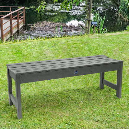 4ft light gray Blue Ridge backless bench on grassy lawn