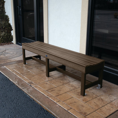 6ft brown Blue Ridge backless bench on stone porch