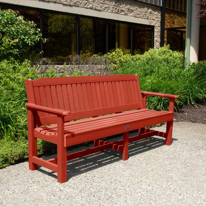 Red 6ft Blue Ridge Garden Bench with bushes in background