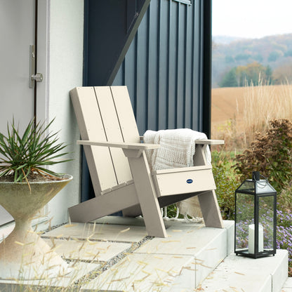 Whitewash Granite Hills Modern Adirondack chair on porch with blanket and pillow