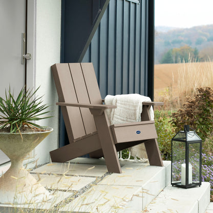 Light brown Granite Hills Modern Adirondack chair on porch with blanket and pillow