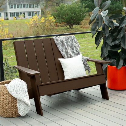 Brown Granite Hills double wide Adirondack chair with blankets and pillow
