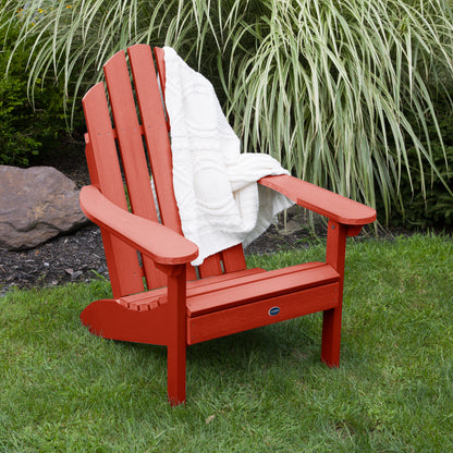 Red Lighthouse Classic Adirondack Chair with blanket on grass