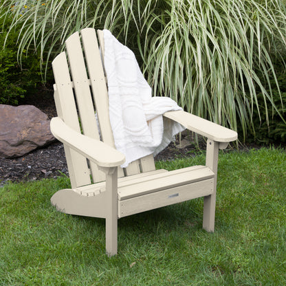 Whitewash Lighthouse Classic Adirondack Chair with blanket on grass