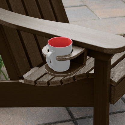 Brown Adirondack chair and cupholder with mug