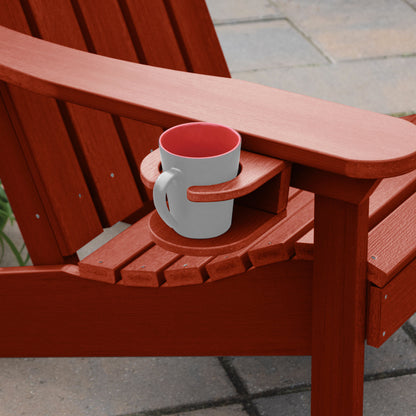 Red Adirondack chair and cupholder with mug