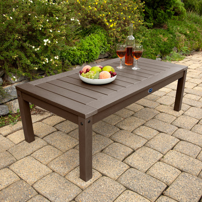 Brown Adirondack Conversation table with wine and fruit bowl 