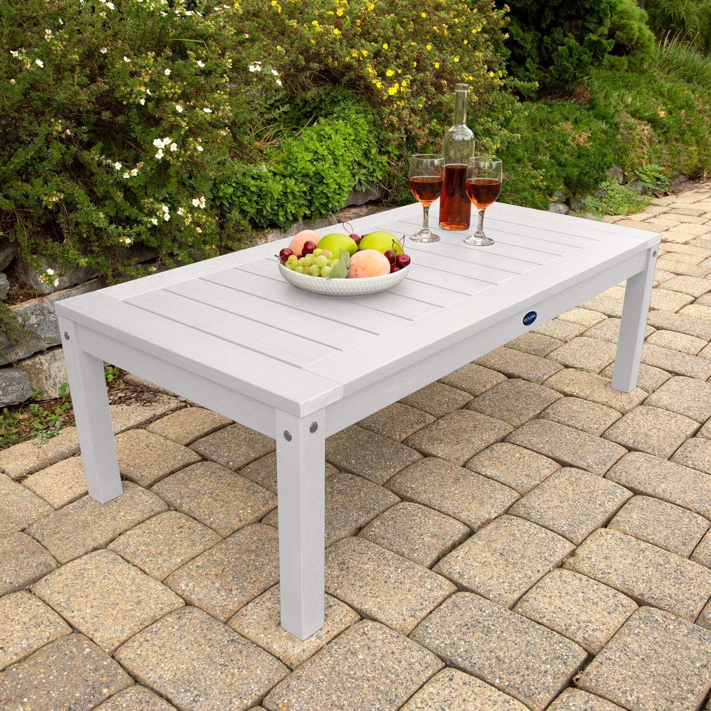 White Adirondack Conversation table with wine and fruit bowl 