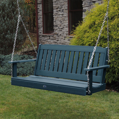 Light blue 5ft Blue Ridge porch swing with stone house in background