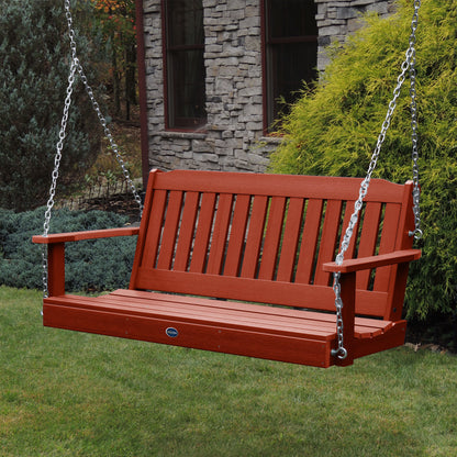 Red 5ft Blue Ridge porch swing with stone house in background