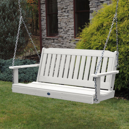 White 5ft Blue Ridge porch swing with stone house in background