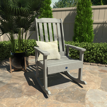 Gray Blue Ridge rocking chair on stone patio with pillow
