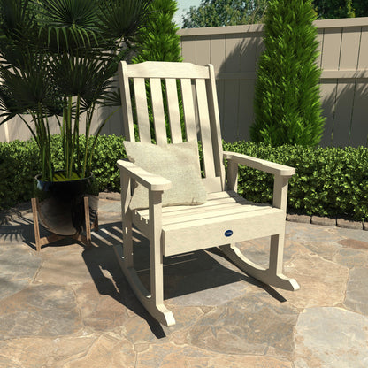 Whitewash Blue Ridge rocking chair on stone patio with pillow
