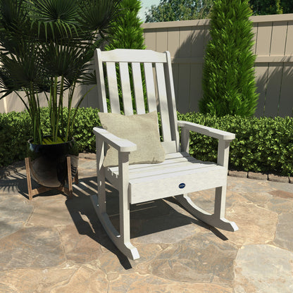 White Blue Ridge rocking chair on stone patio with pillow