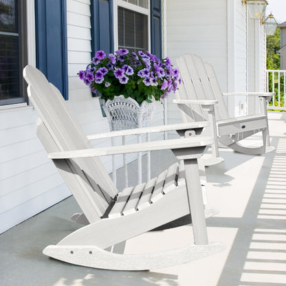 Two white Lighthouse Adirondack rocking chairs on front porch with flowers