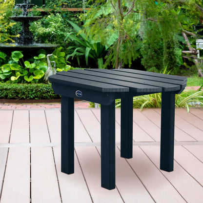 Dark blue Lighthouse side table on wooden patio
