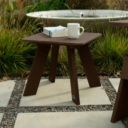 Brown Granite Hills side table with book and coffee mug