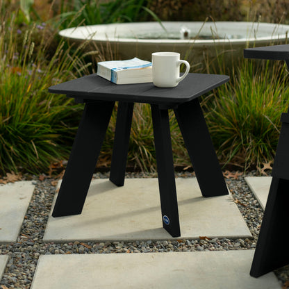 Black Granite Hills side table with book and coffee mug