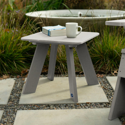 Light gray Granite Hills side table with book and coffee mug