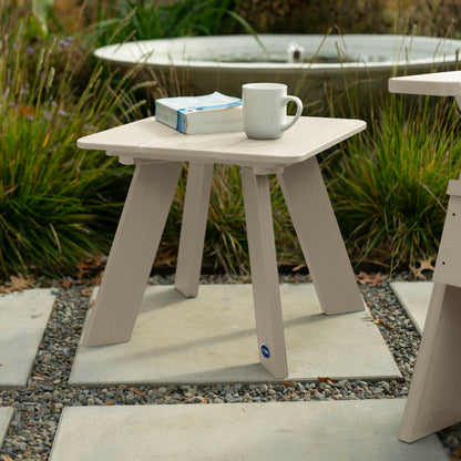 Whitewash Granite Hills side table with book and coffee mug