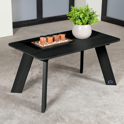 Black Granite Hills coffee table with candles and plant