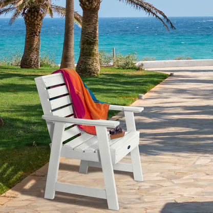 White Sunrise Coast garden chair on walkway near water