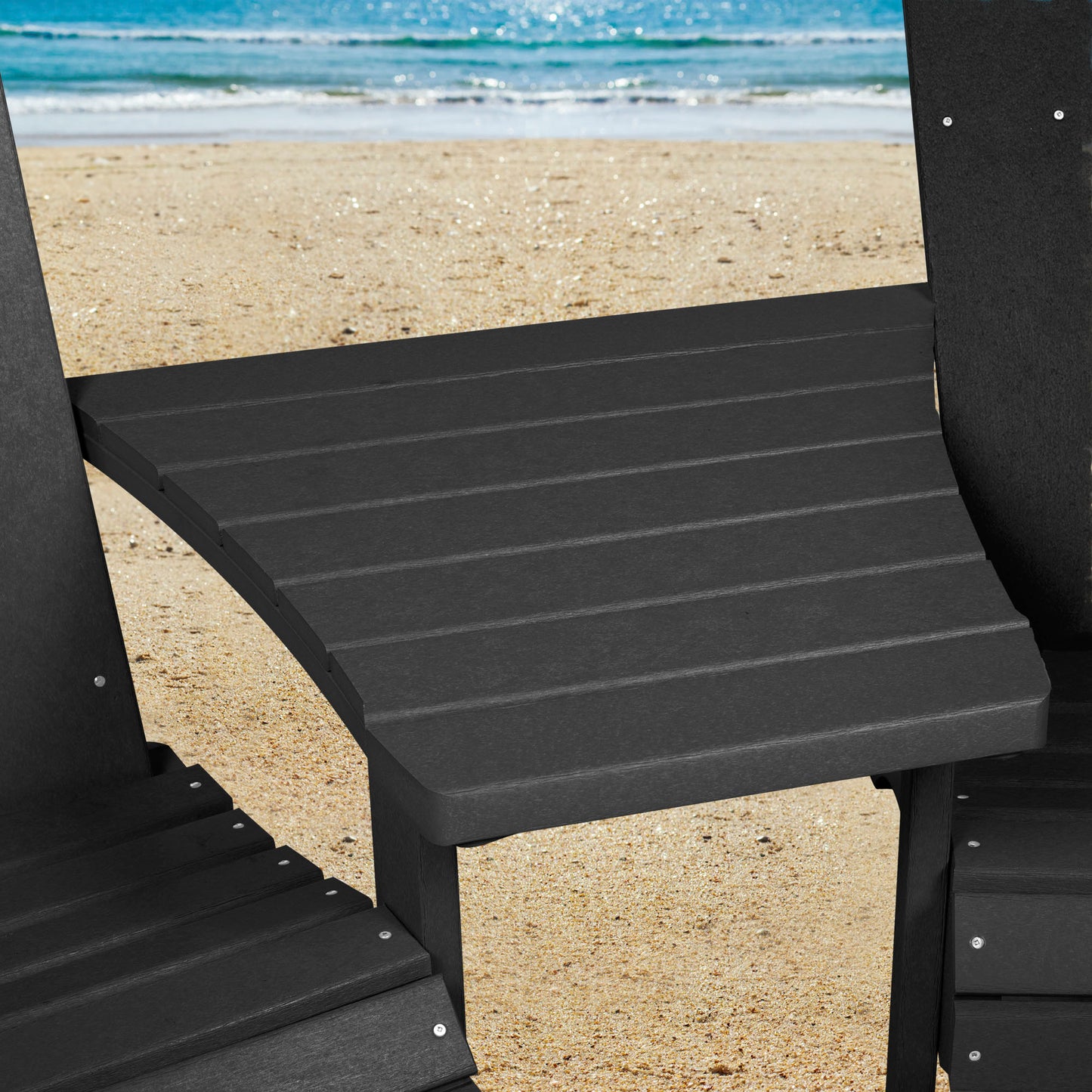 Black Sunrise Coast comfort height chairs and connecting table on beach