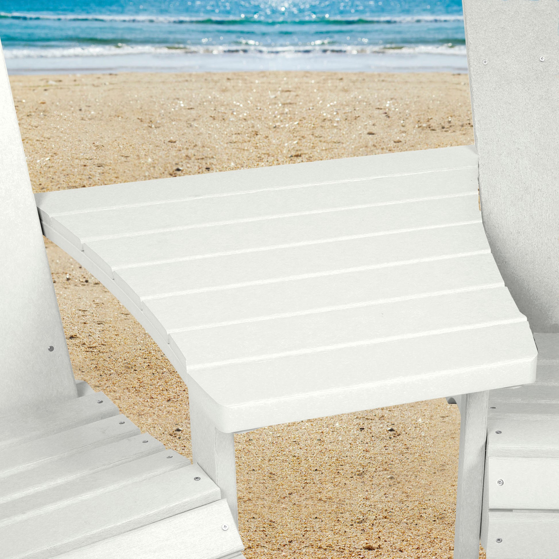 White Sunrise Coast comfort height chairs and connecting table on beach