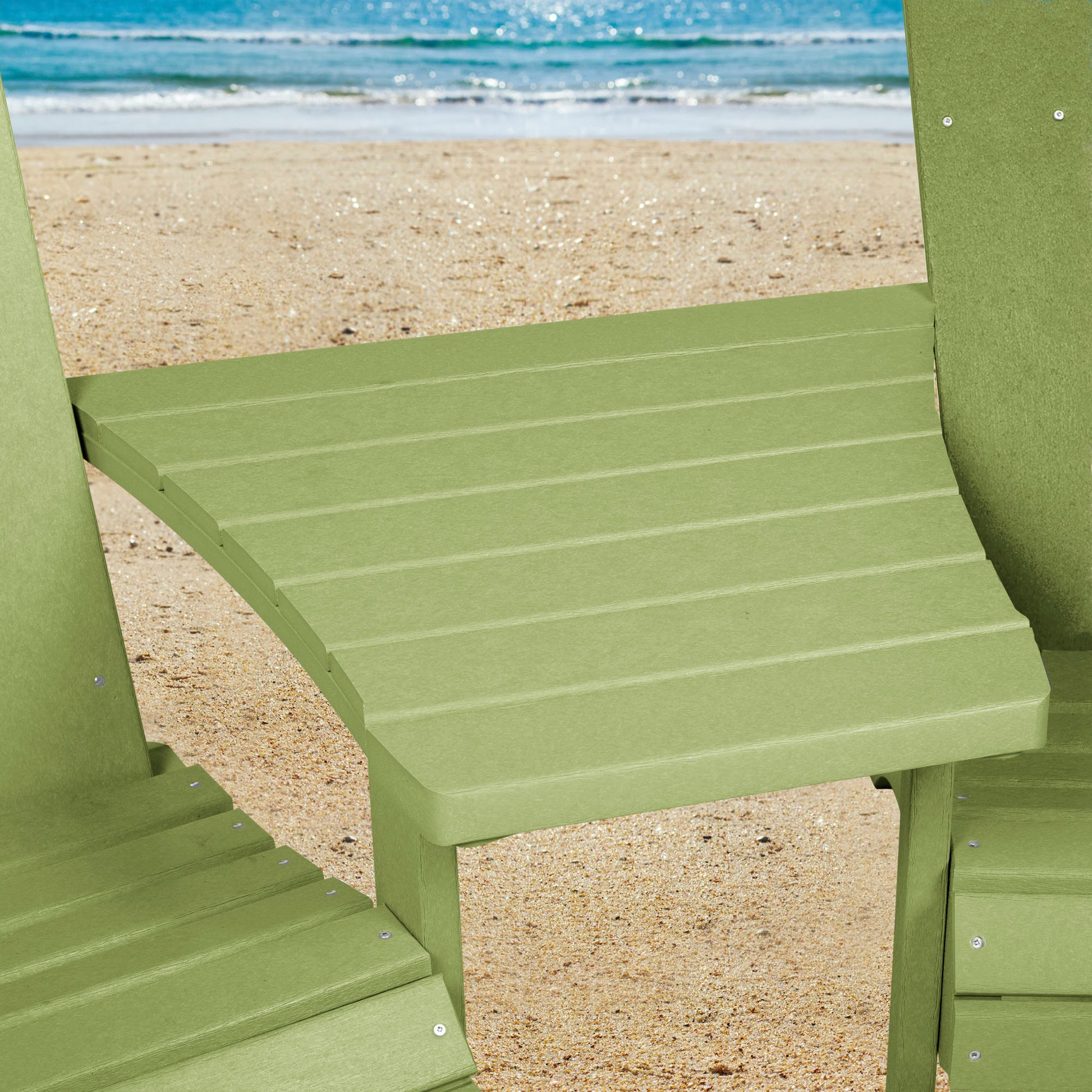 Green Sunrise Coast comfort height chairs and connecting table on beach