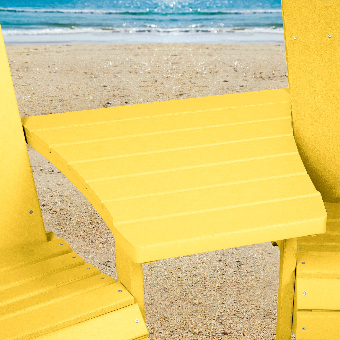 Yellow Sunrise Coast comfort height chairs and connecting table on beach